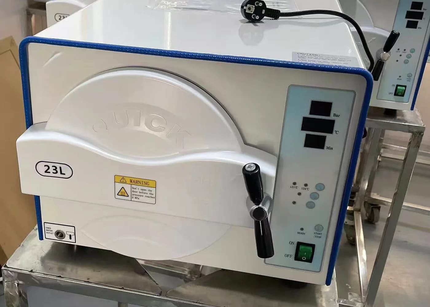 A Class B benchtop autoclave awaiting inspection before dispatch